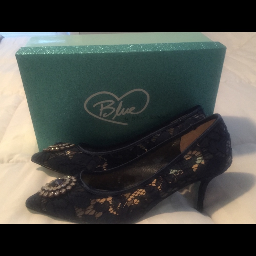 Never worn size 7.5 Betsey Johnson blue shoes